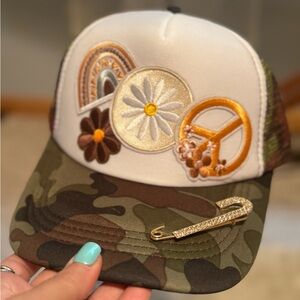 Trucker hat camo with pin.